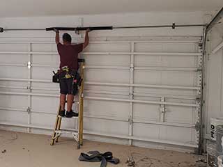 Broken Garage Door Spring Replacement, Coon Rapids Repairmen Near You